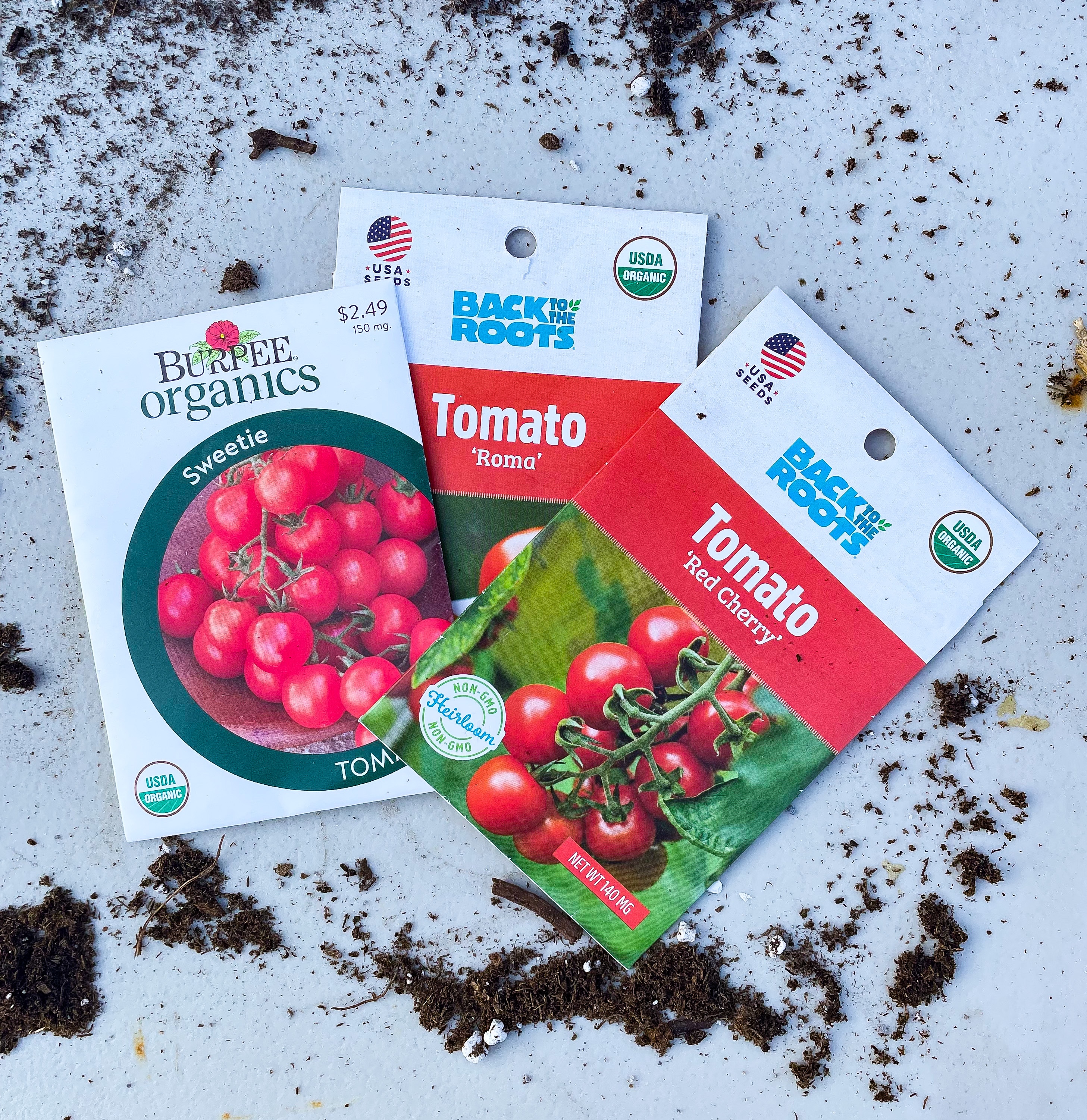 packets of seeds on a table outside