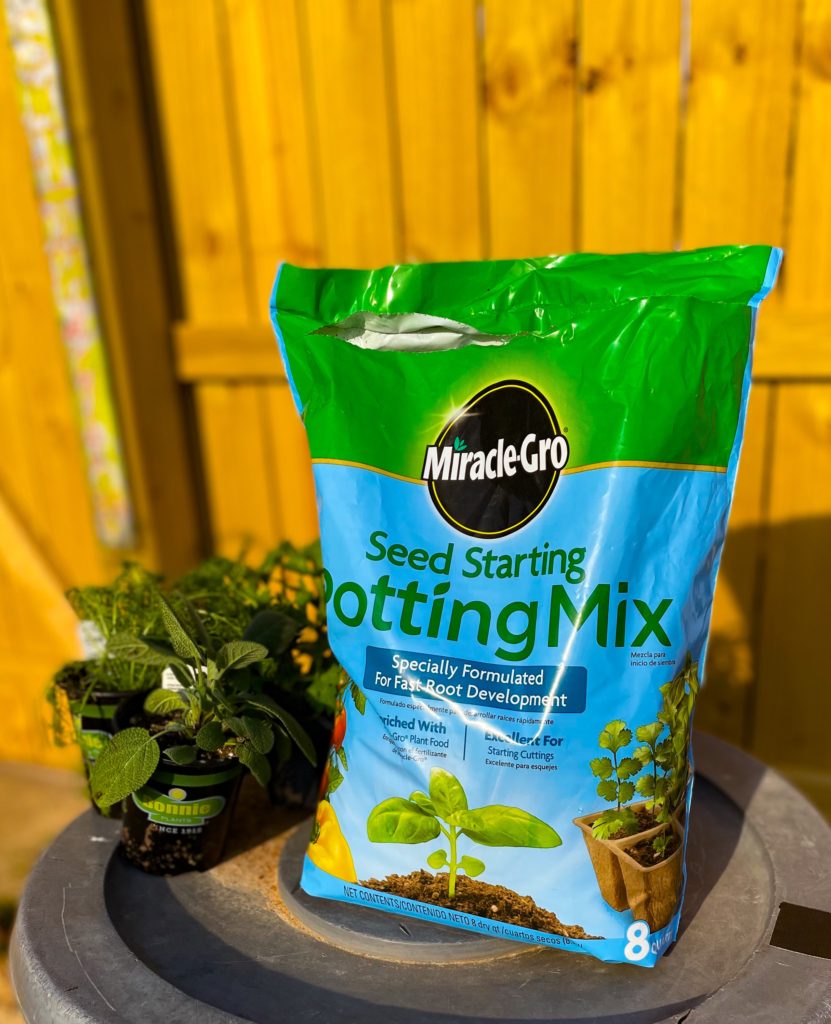 potting mix on a table outside