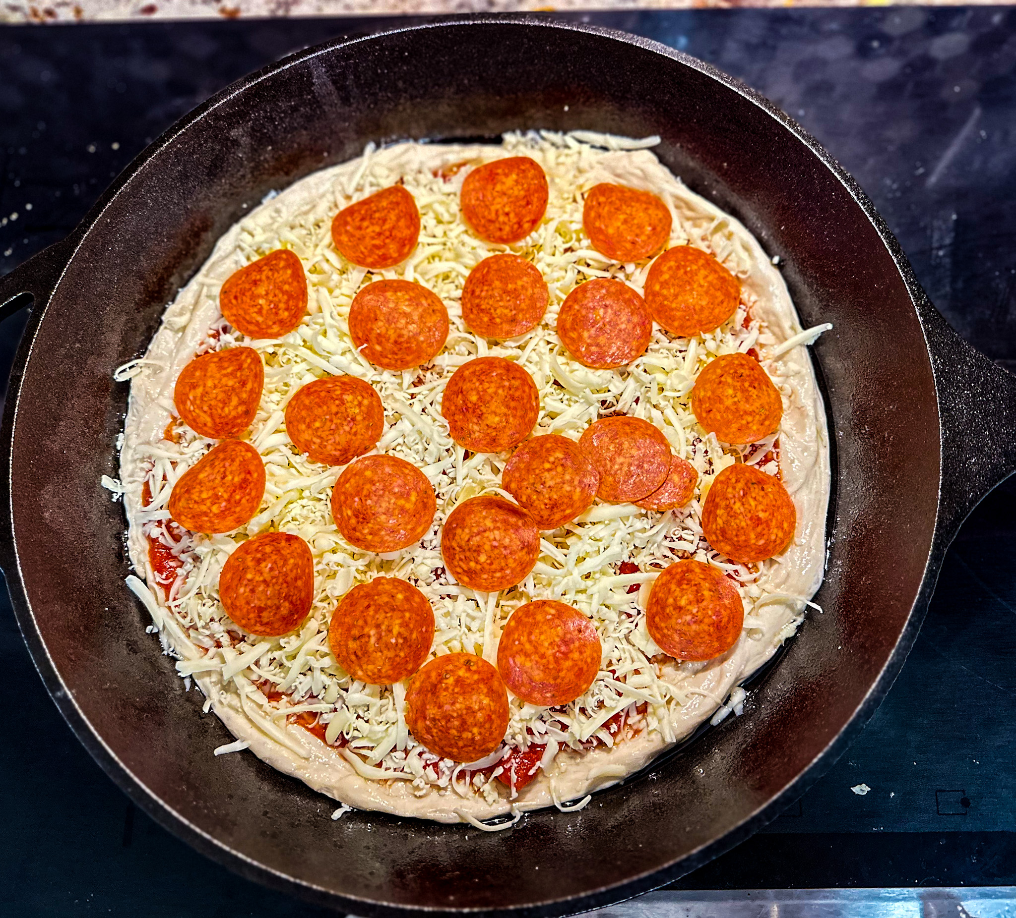 pizza in cast iron pan