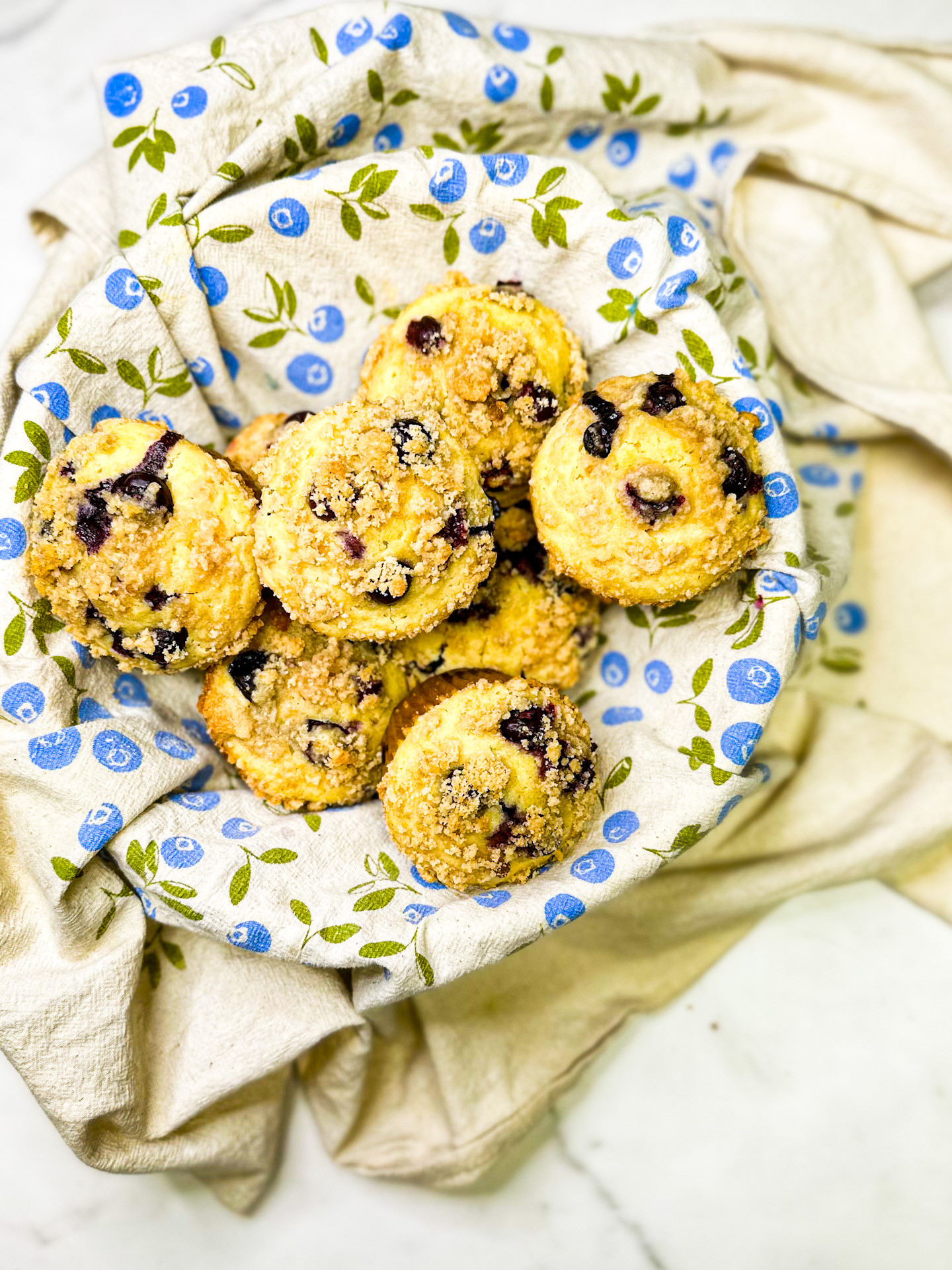 blueberry muffins in a basket